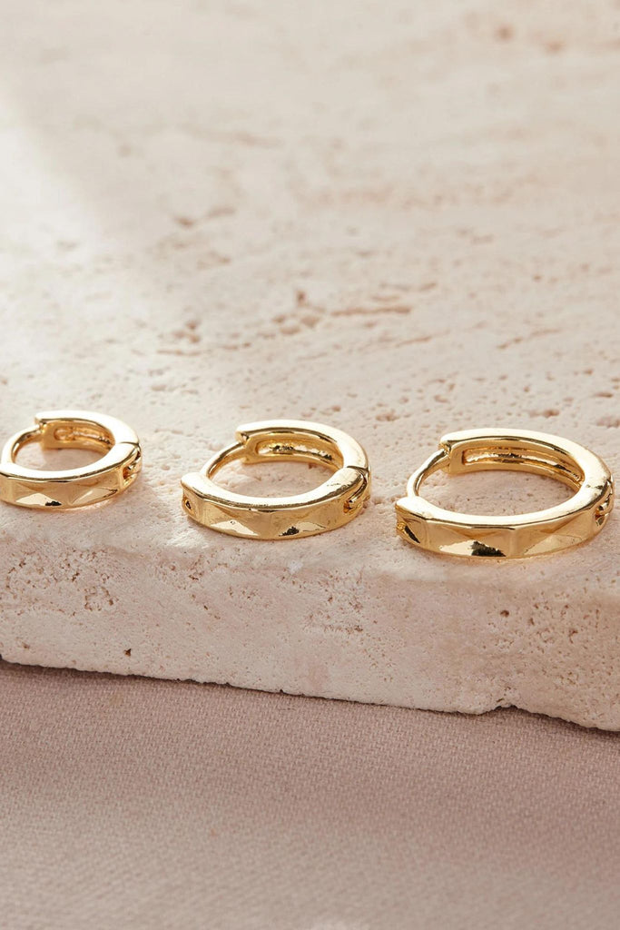 close up of the gold plated silver angular hoops