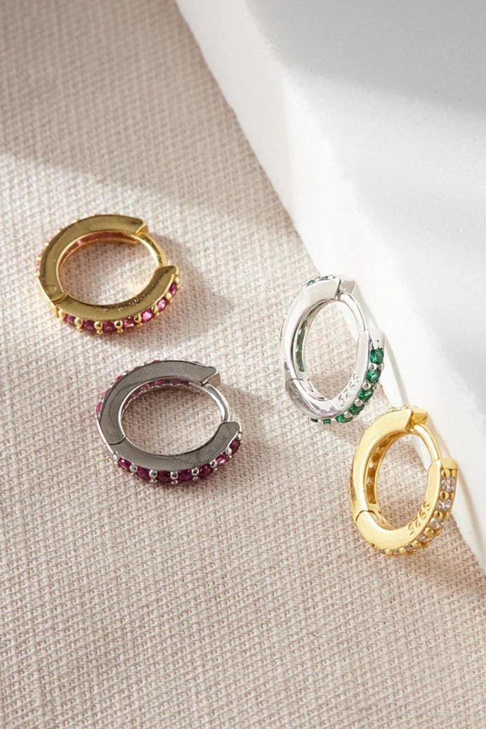 close up view of some of the styles availablem showing clearly the embedded cz crystals on the rims of the hoops