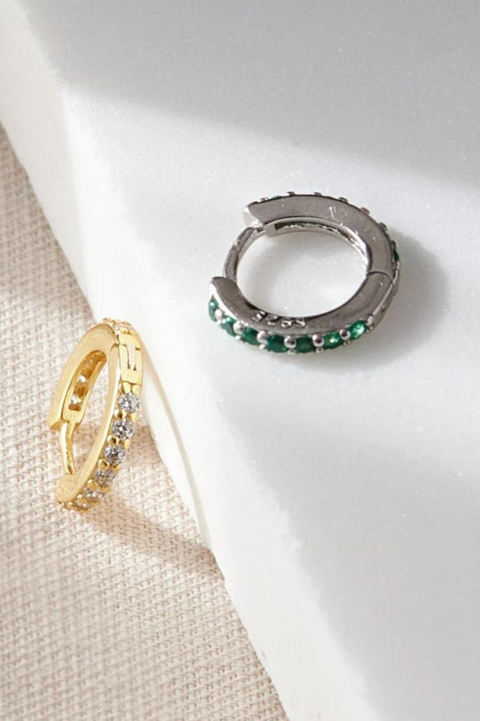 close up of the hoops, showing the s925 sterling silver mark on the rim