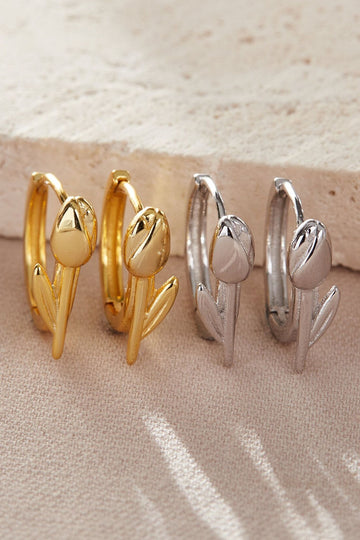 silver and gold plated s925 sterling silver hoop earrings with a tulip flower detail on the outer rim of the earrings