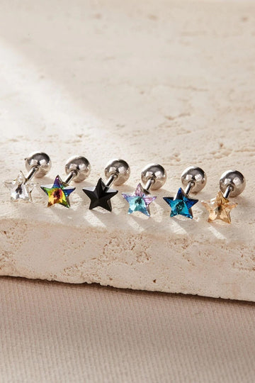 multiple colours of dainty star stud earrings each with screw on ball back fastenings