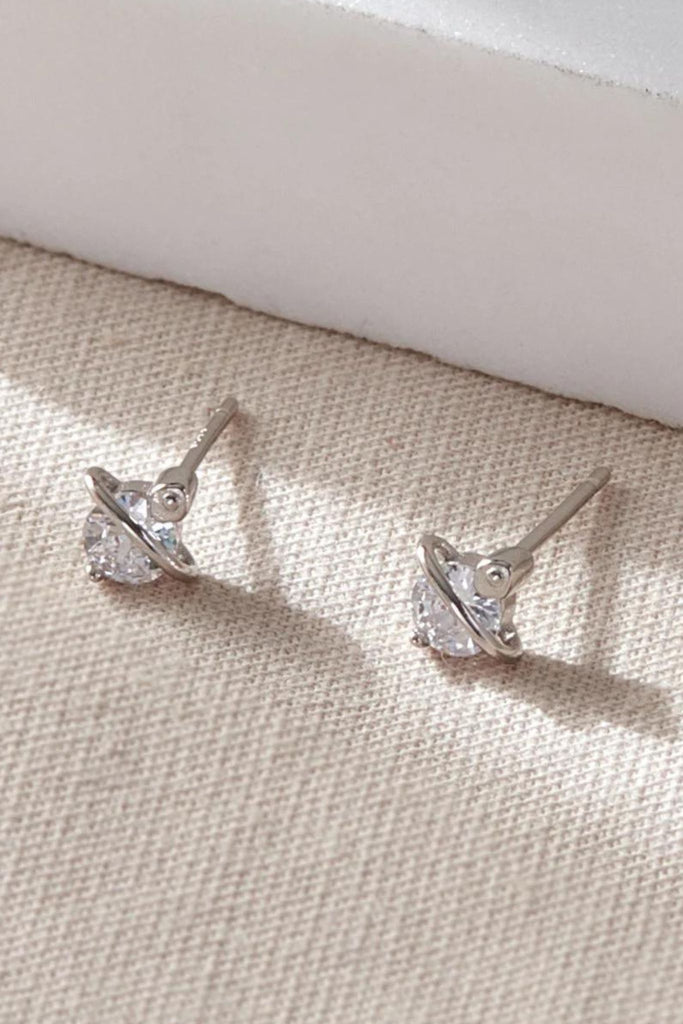 close up of the silver galaxy stud earrings