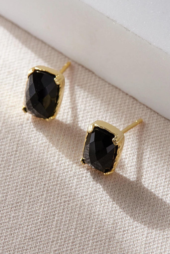 rectangular shaped black cz stud earrings set in gold plated sterling silver, the studs are large