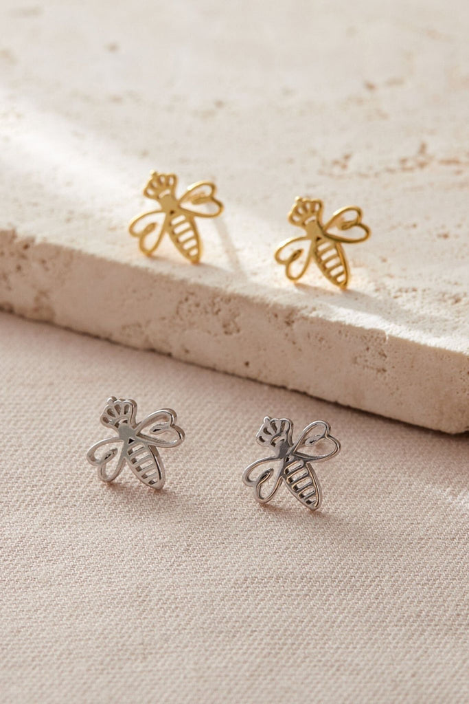 silver and gold bee stud earrings, the bees are wearing crowns to show that they are the queen bee