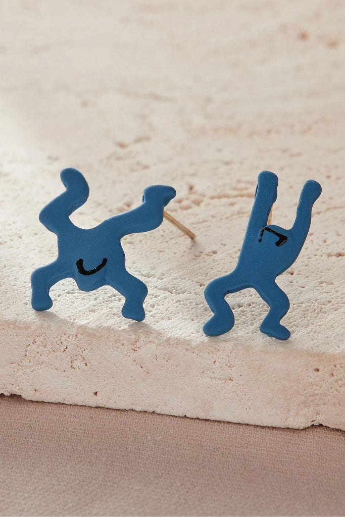 close up of the blue leaping frog earrings