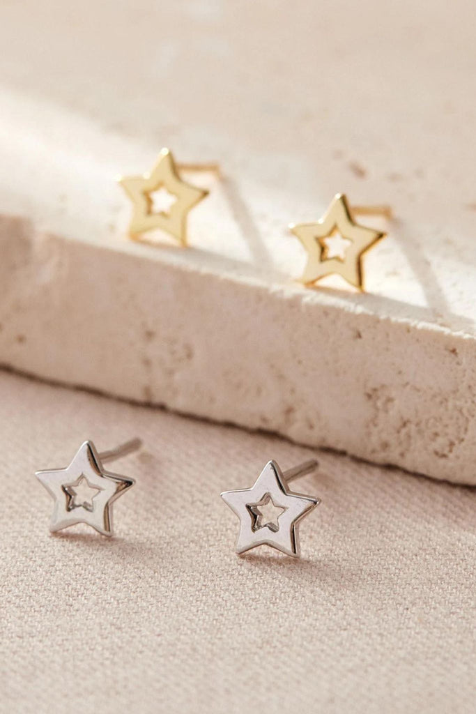 sterling silver star outline stud earrings made from silver and gold plated sterling silver