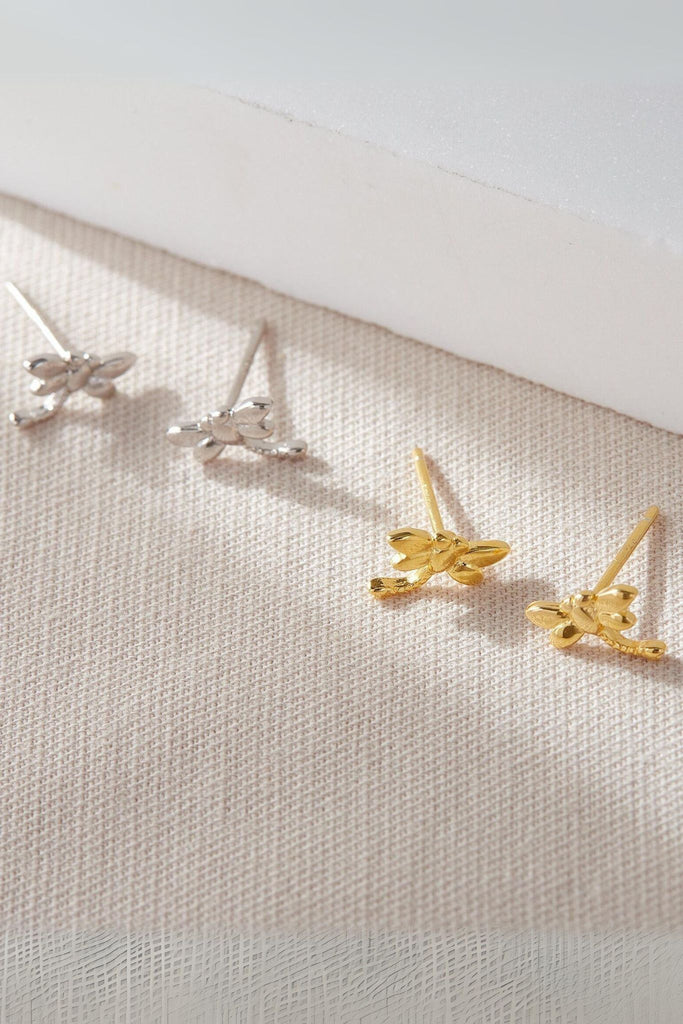 silver and gold coloured dragonfly stud earrings