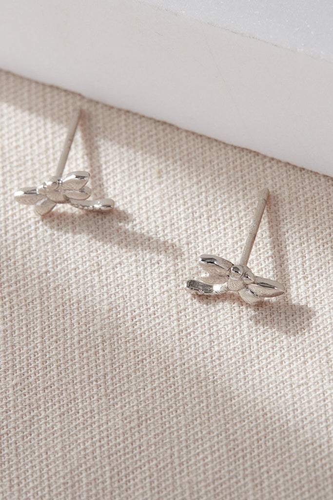 close up of the silver dragonfly studs