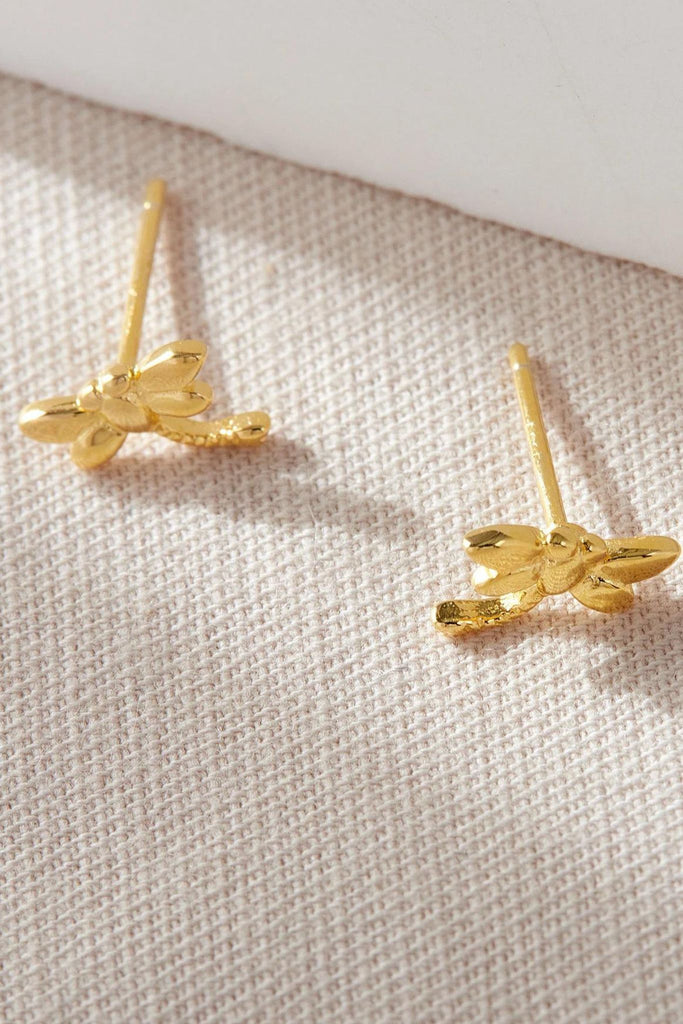 close up of the gold plated sterling silver dragonfly studs