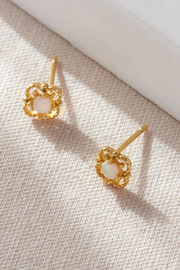 close up of the gold coloured opal floral studs