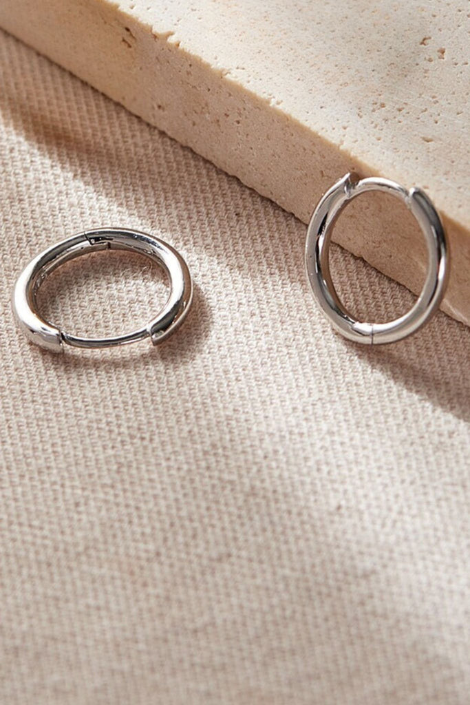 close up of the plain silver hoops 