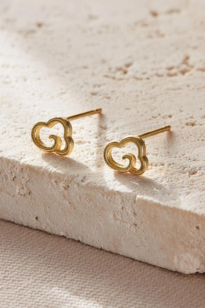 close up of the gold coloured cloud studs