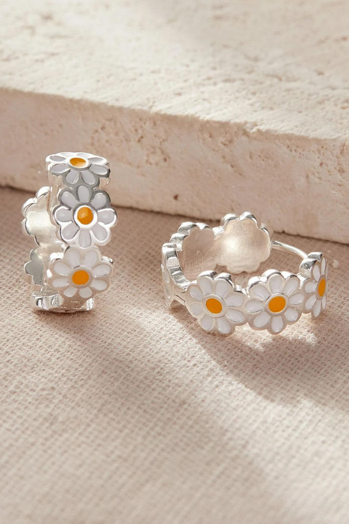 showing the daisy earrings hoop fastening
