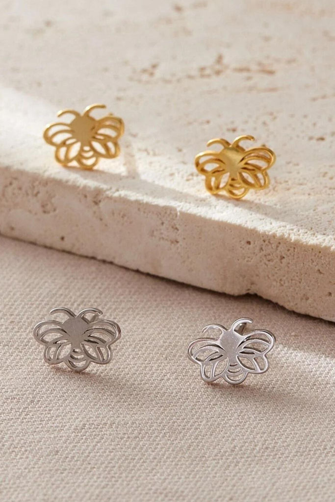 silver and gold coloured openwork bee stud earrings