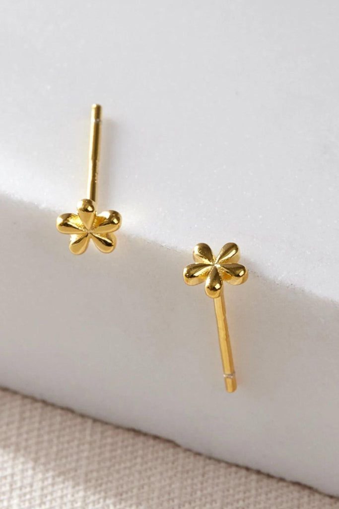 close up of the gold coloured S925 dainty floral stud earrings