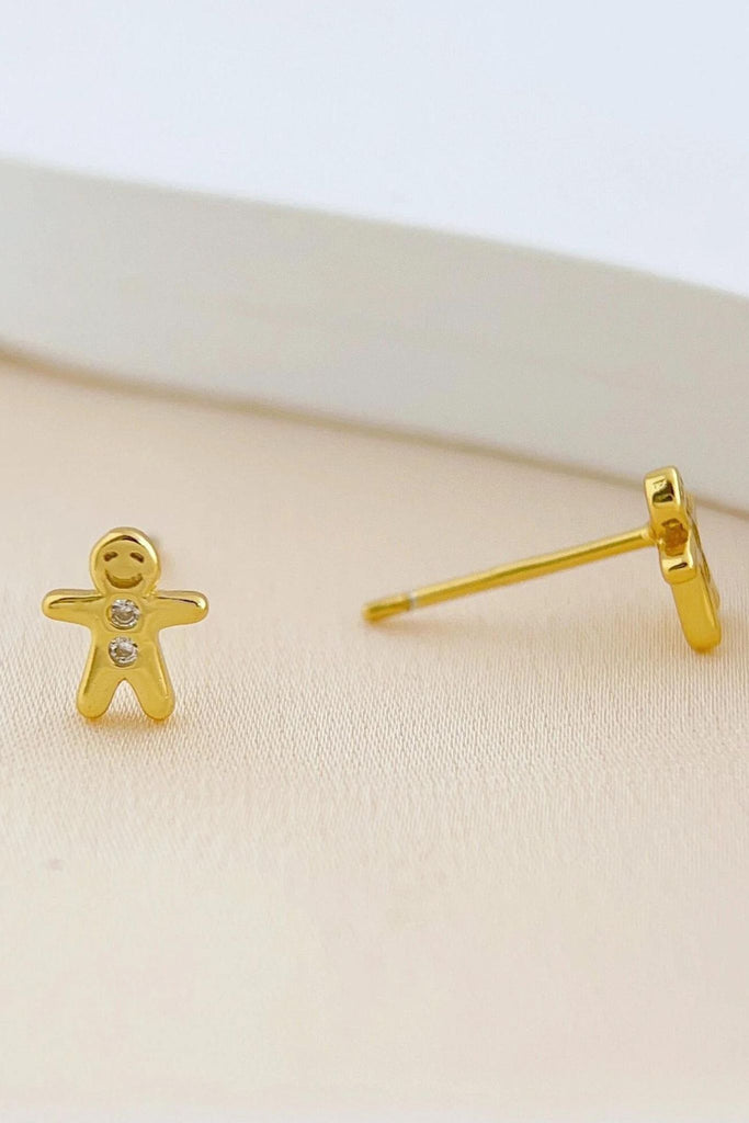 close up of the gold gingerbread stud earrings