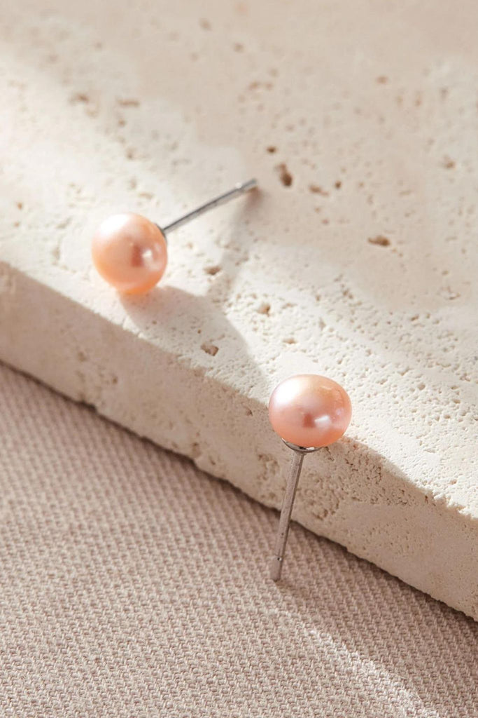 close up of the pink pearl studs