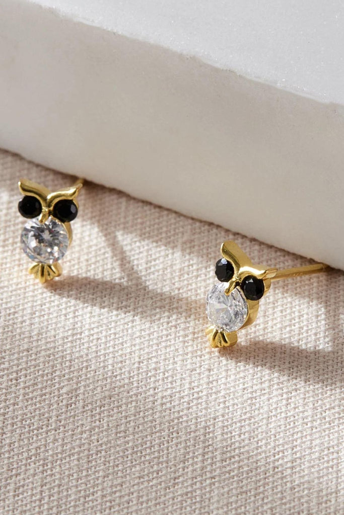 close up of the gold plated silver owl stud earrings