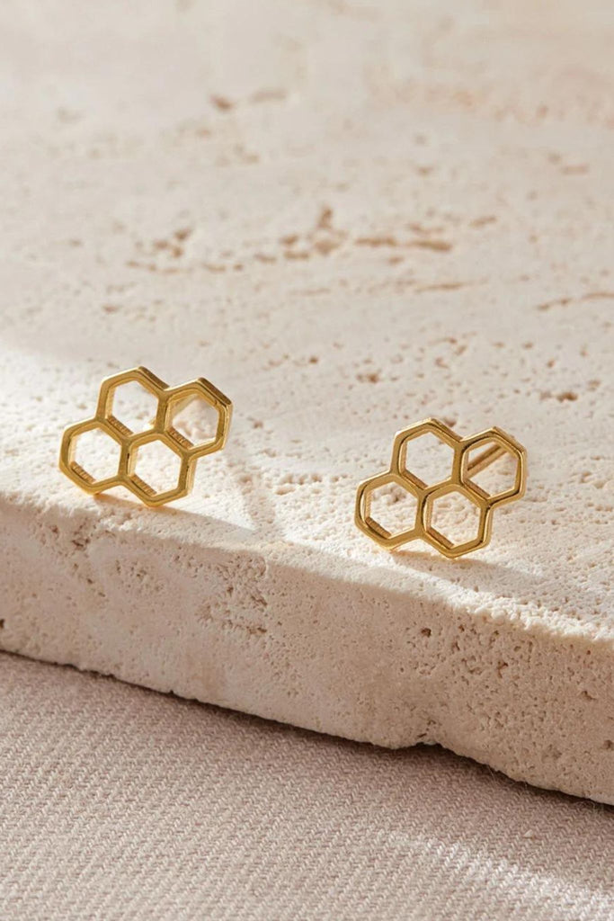 close up of the gold plated honeycomb stud earrings