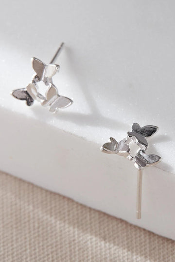 stud earrings featuring three dainty butterflies adjoined in a loop