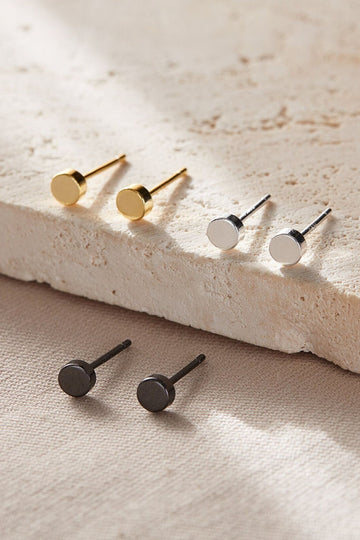 three pairs of dainty round disc shaped stud earrings, silver, gold and black all made from S925 sterling silver