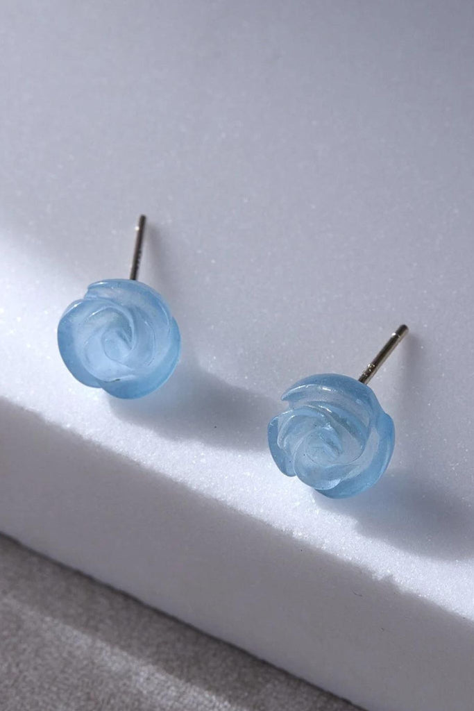 close up of the blue floral rose stud earrings