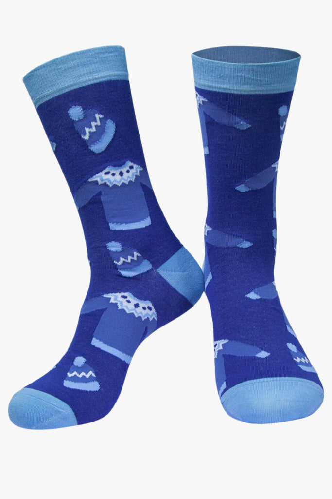 men's blue dress socks with a pattern of winter sweaters and hats