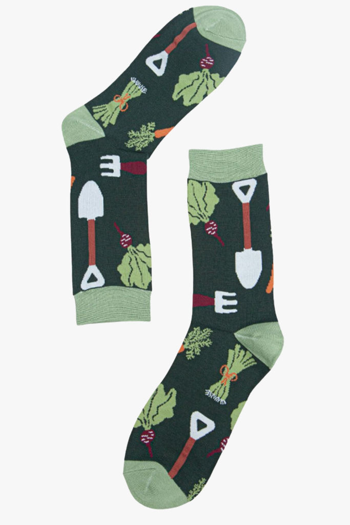 green bamboo socks with a pattern of garden tools