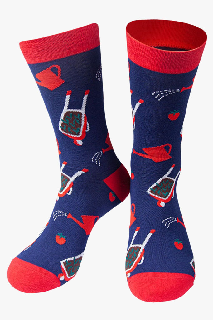 navy blue, red dress socks featuring wheelbarrows, watering cans and tomatos