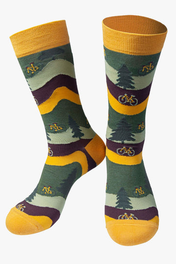 green, brown, yellow striped dress socks featuring bicycles and trees