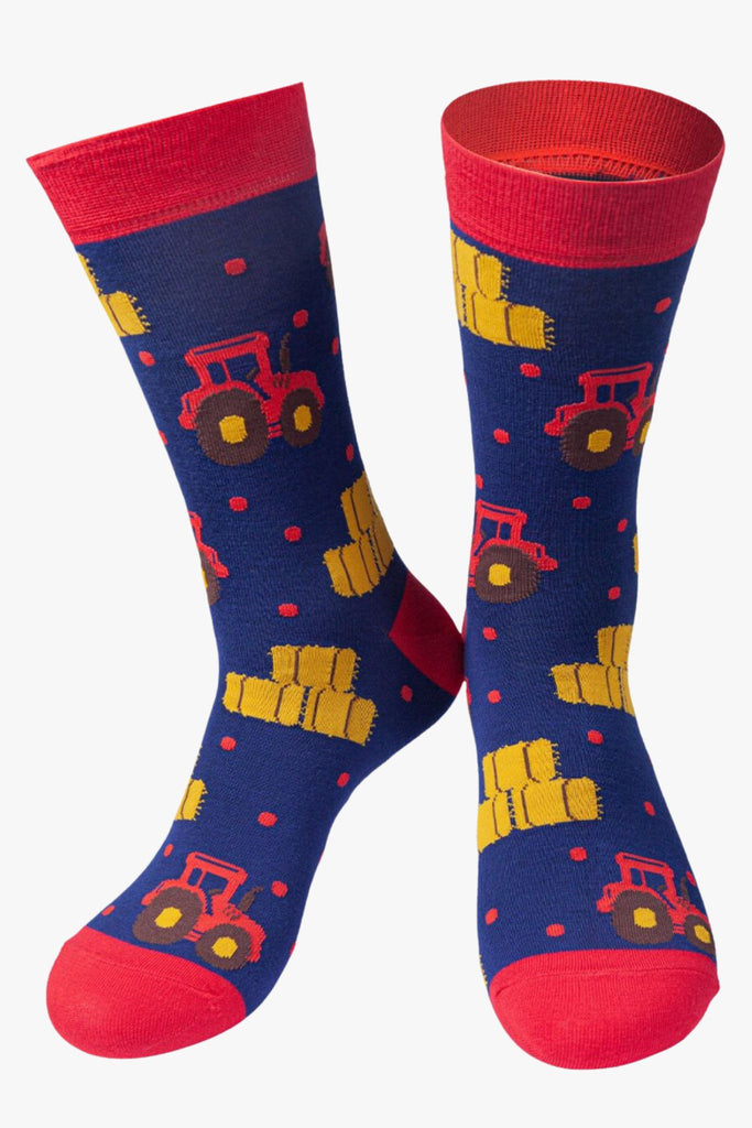 navy blue, red dress socks with red tractors and yellow hay bales