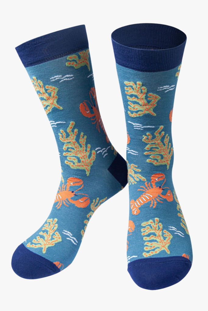 blue bamboo socks designed to look like an under water scene with lobsters and seaweed