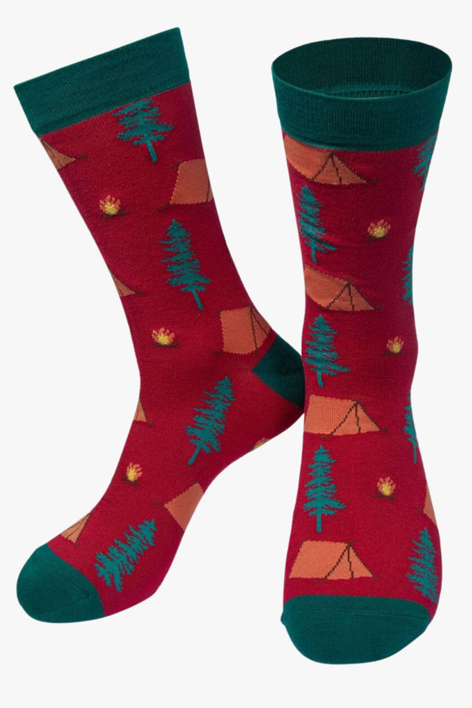 red bamboo dress socks with a pattern of trees and tents on them