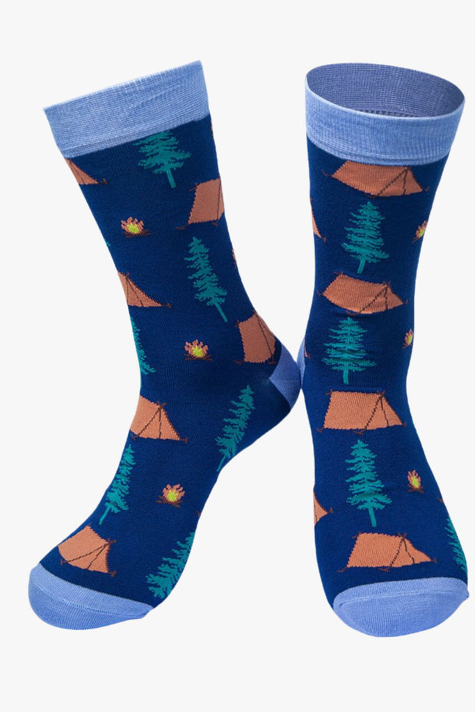 blue bamboo dress socks with a pattern of tents, trees and campfires all over