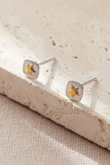 sterling silver square stud earrings with gold plated raised five pointed stars in the middle