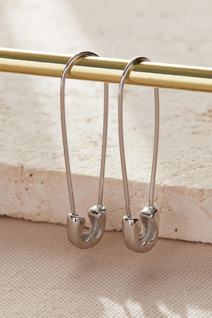 the long length of sterling silver safety pin earrings, 32mm in length