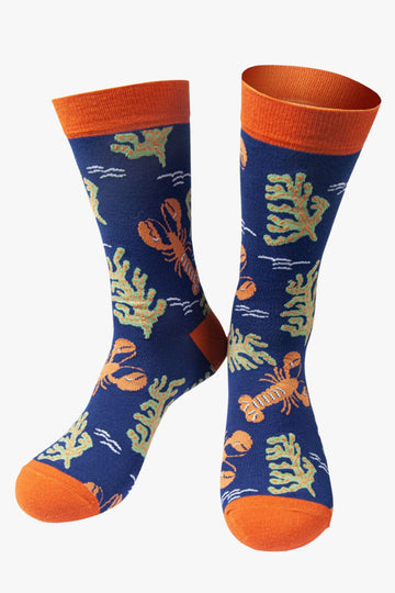 blue bamboo socks artictically designed to look like an underwater scene with lobsters and seaweed