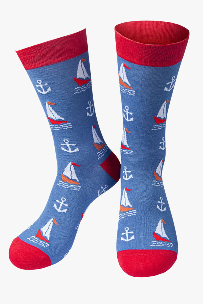 Mens blue bamboo socks with red toes and cuffs. Featuring sailing boat and anchors