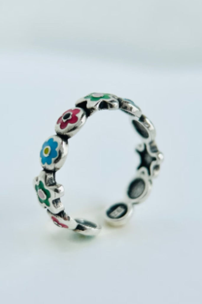 silver and multicoloured enamel floral ring