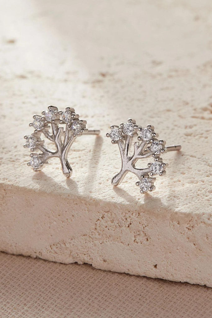 close up of the silver tree of life stud earrings