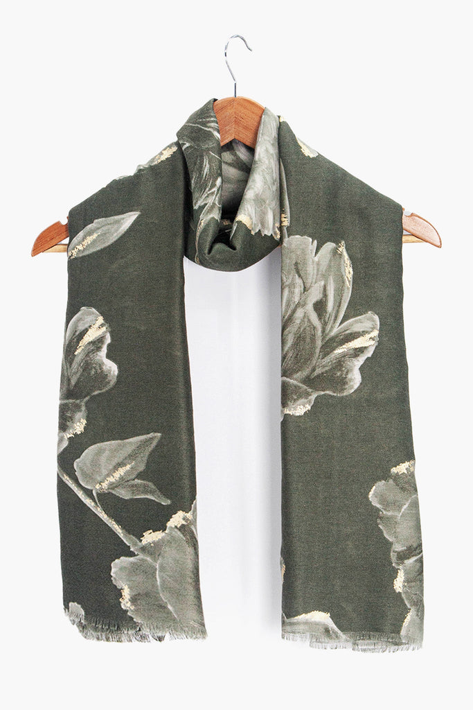 eleanor-khaki-abstract-floral-lightweight-scarf-draped-around-coat-hanger