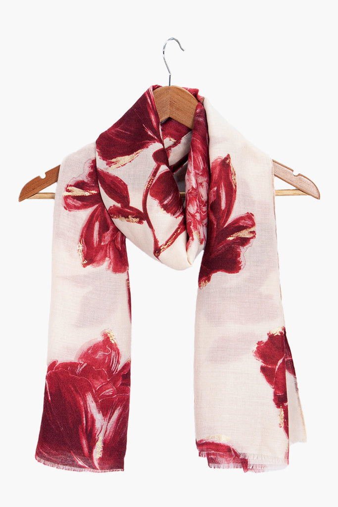 eleanor-red-abstract-floral-lightweight-scarf-draped-around-coat-hanger