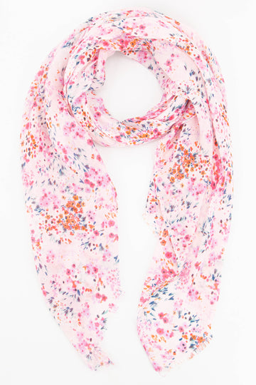 light pink lightweight scarf with a clustered ditsy floral print pattern all over
