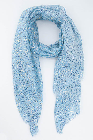 light blue lightweight scarf with an all over dandelion petal pattern