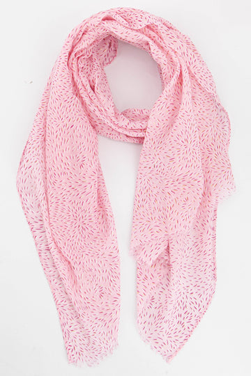 light pink lightweight scarf with an all over dandelion petal pattern