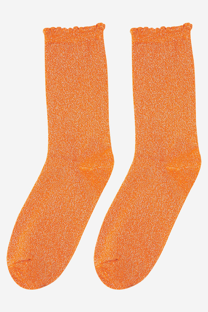 orange sparkly glitter socks with scalloped cuffs and an all over shimmer