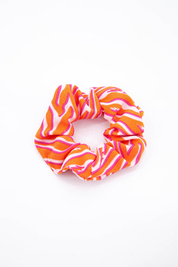 pink and orange zebra print and lighting bolt hair scrunchie