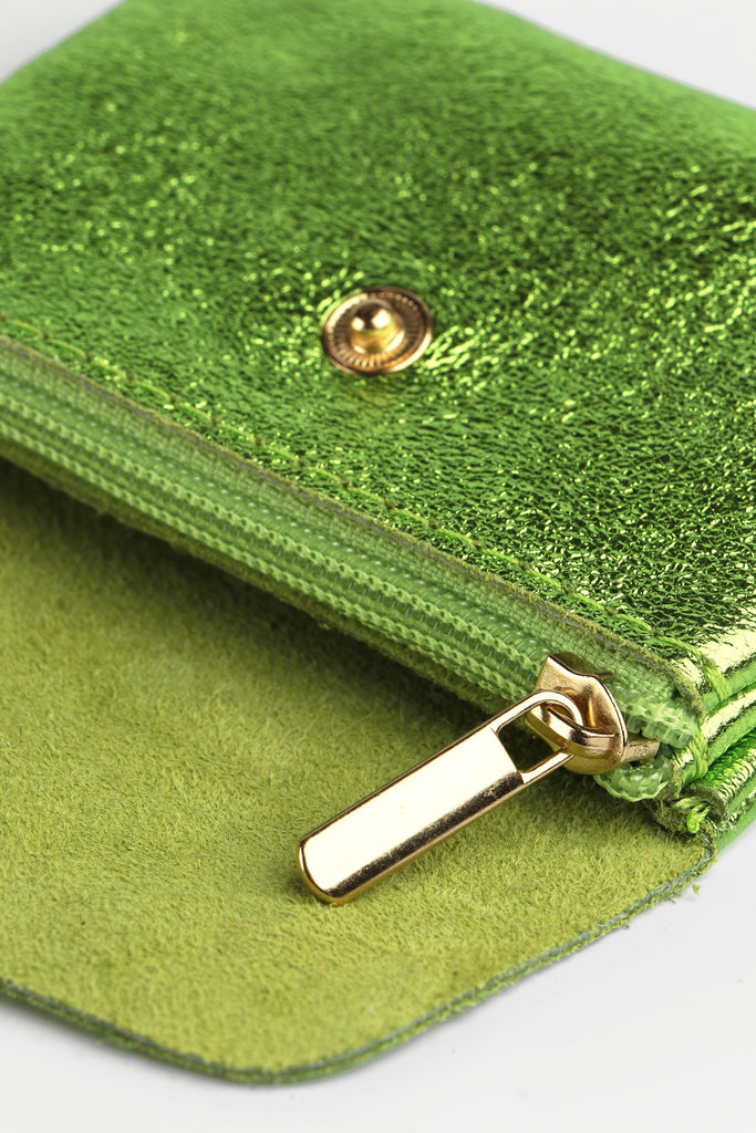 internal zip pockets of the green leather coin purse