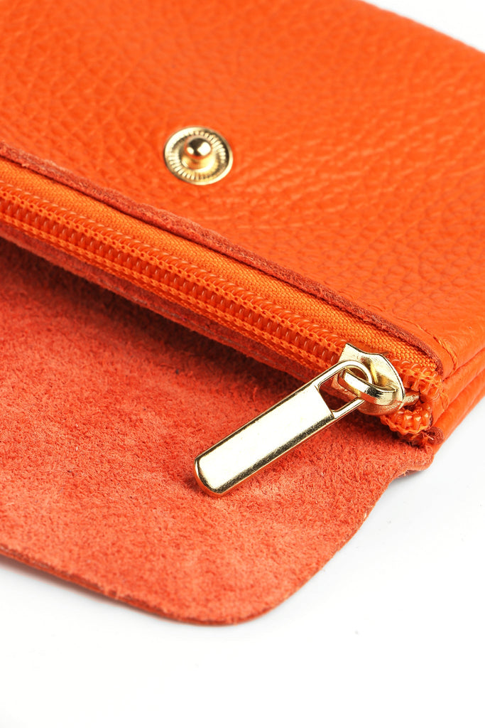 showing the inside of the coin purse with an internal zip closure copartment