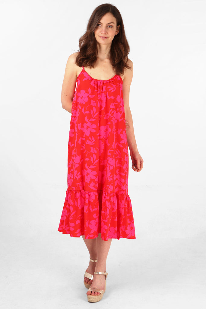 red and pink floral tiered slip dress with a round neck and spaghetti straps